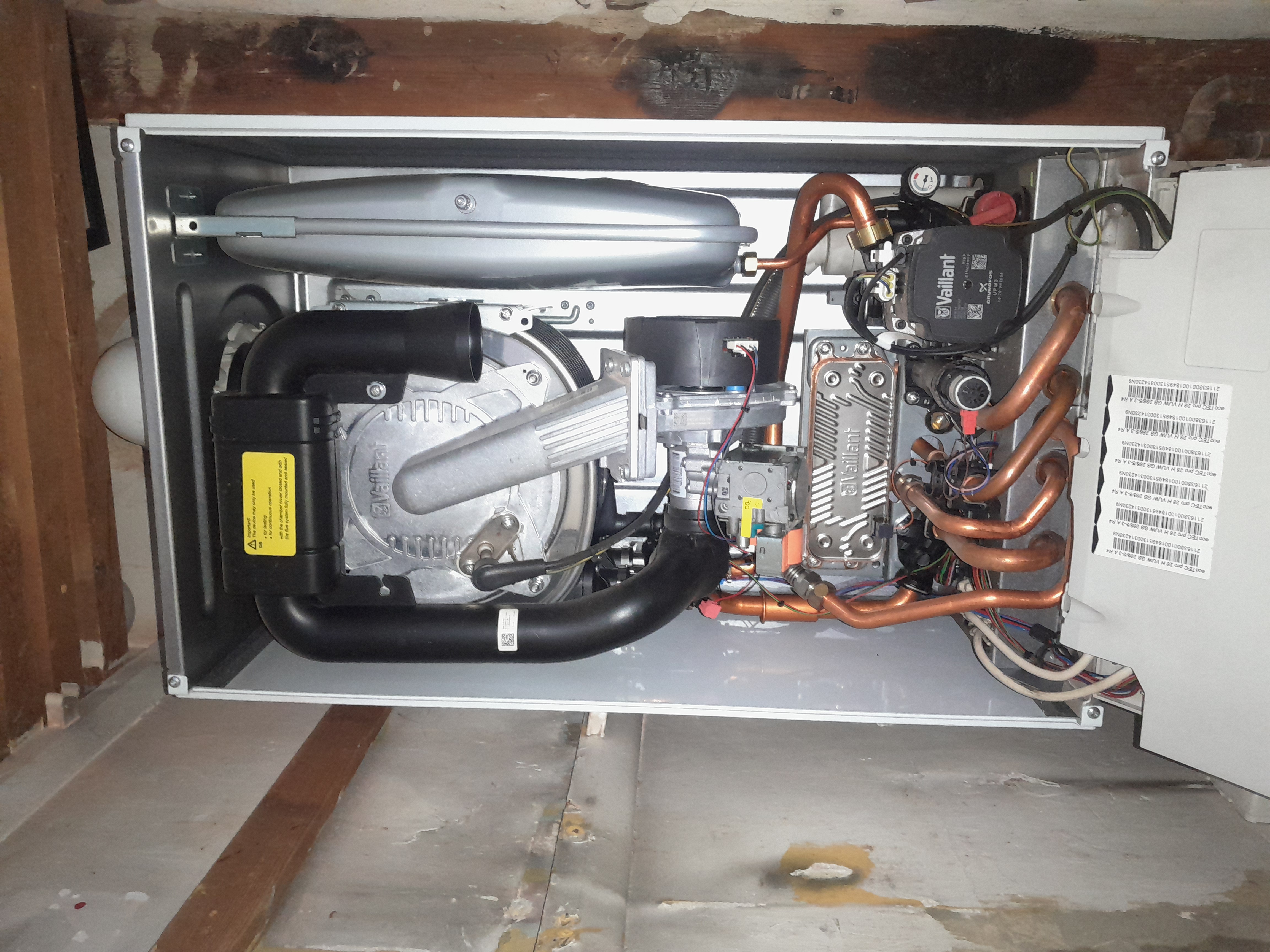 Boiler internals being inspected during a repair call-out in Surbiton