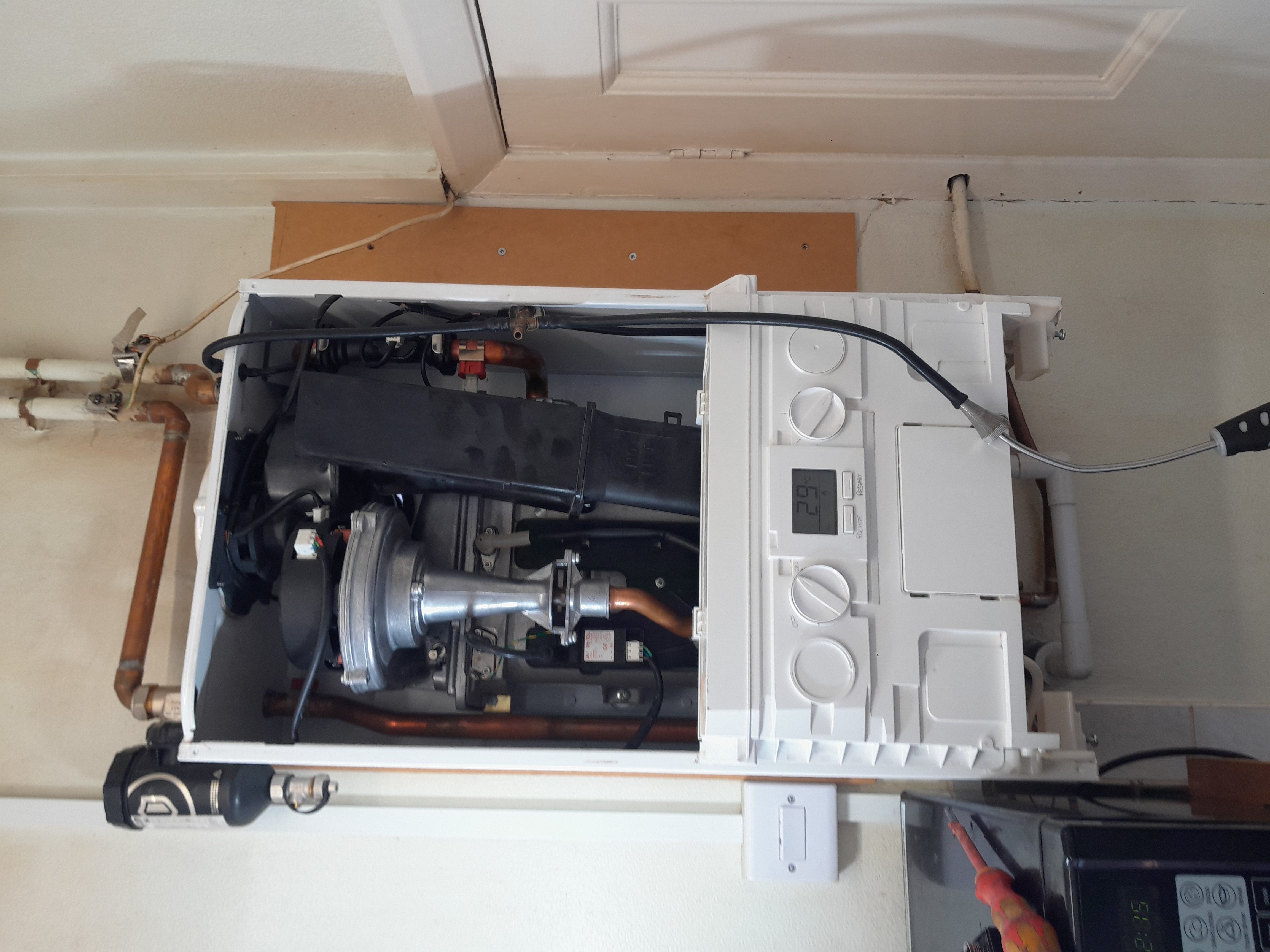Boiler internals being inspected during a repair call-out in Kingston upon Thames
