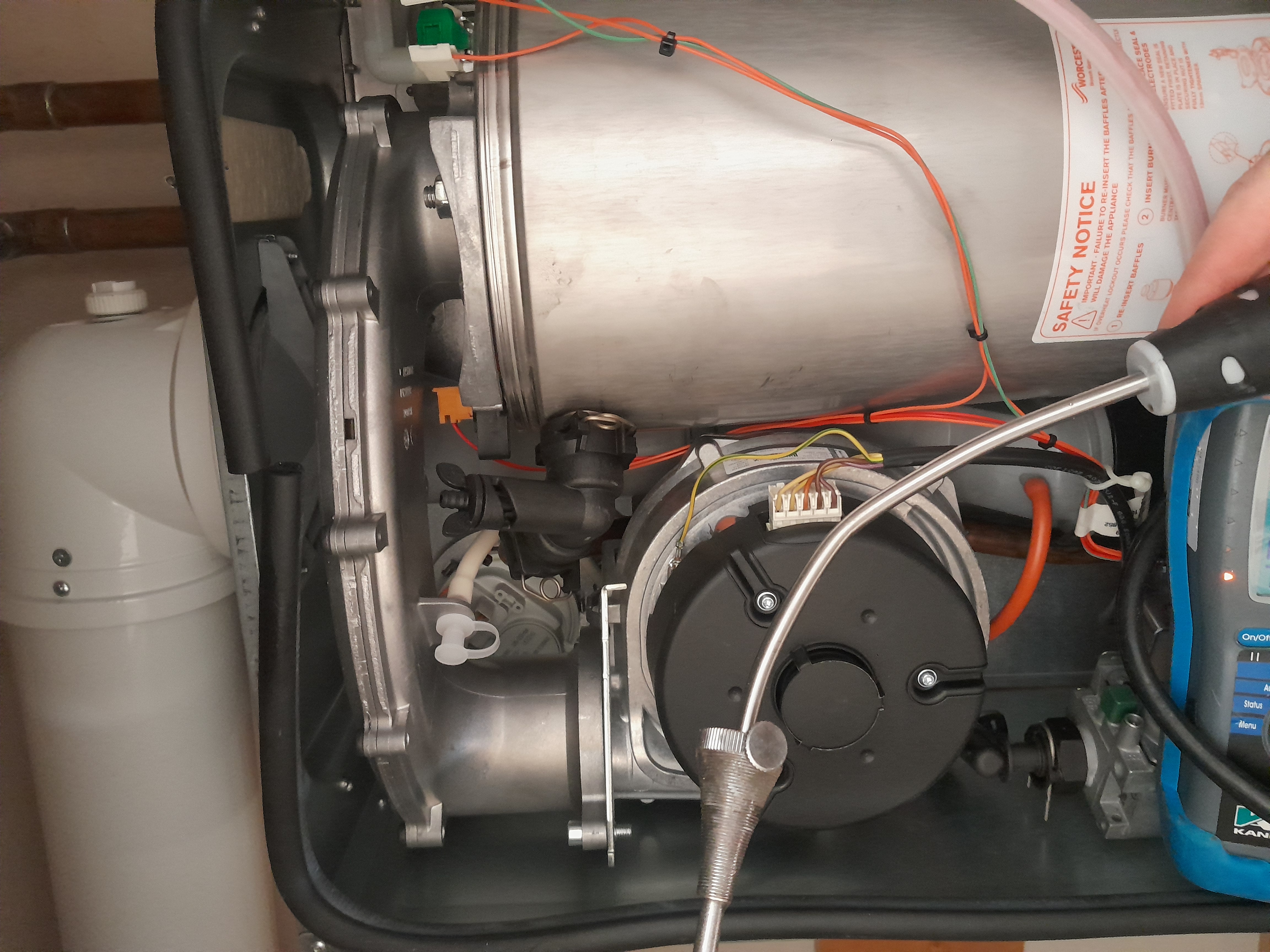 Boiler internals being inspected during a repair call-out in Chessington