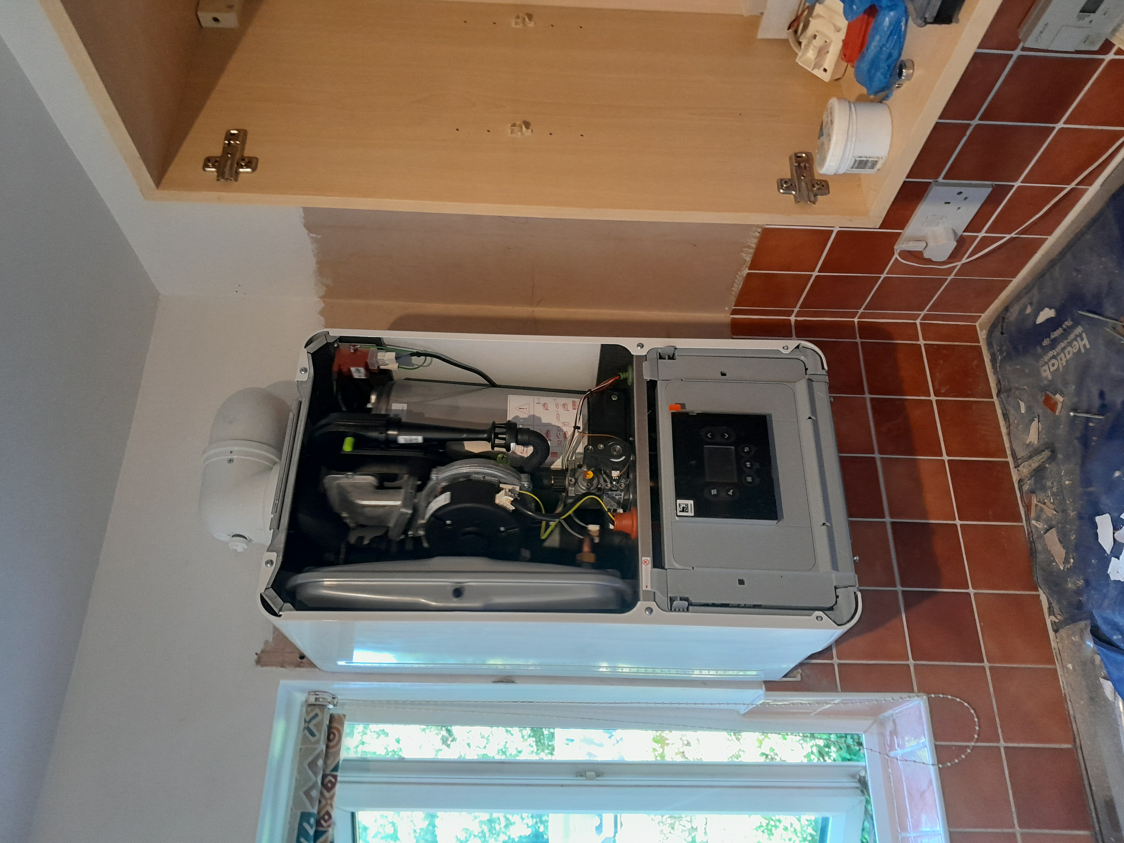 Boiler internals being inspected during a repair call-out in Worcester Park