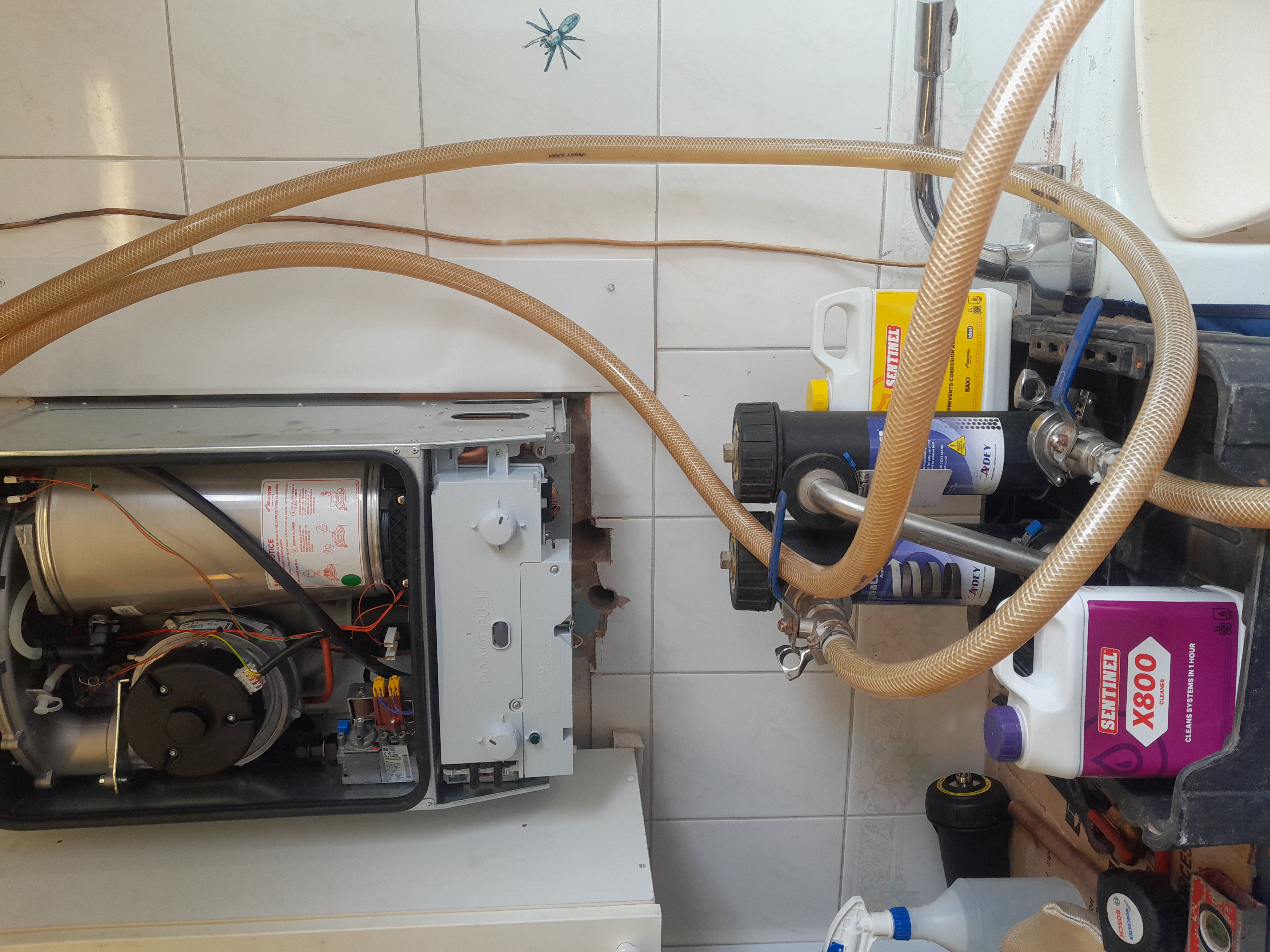 Boiler internals being inspected during a repair call-out in Wimbledon