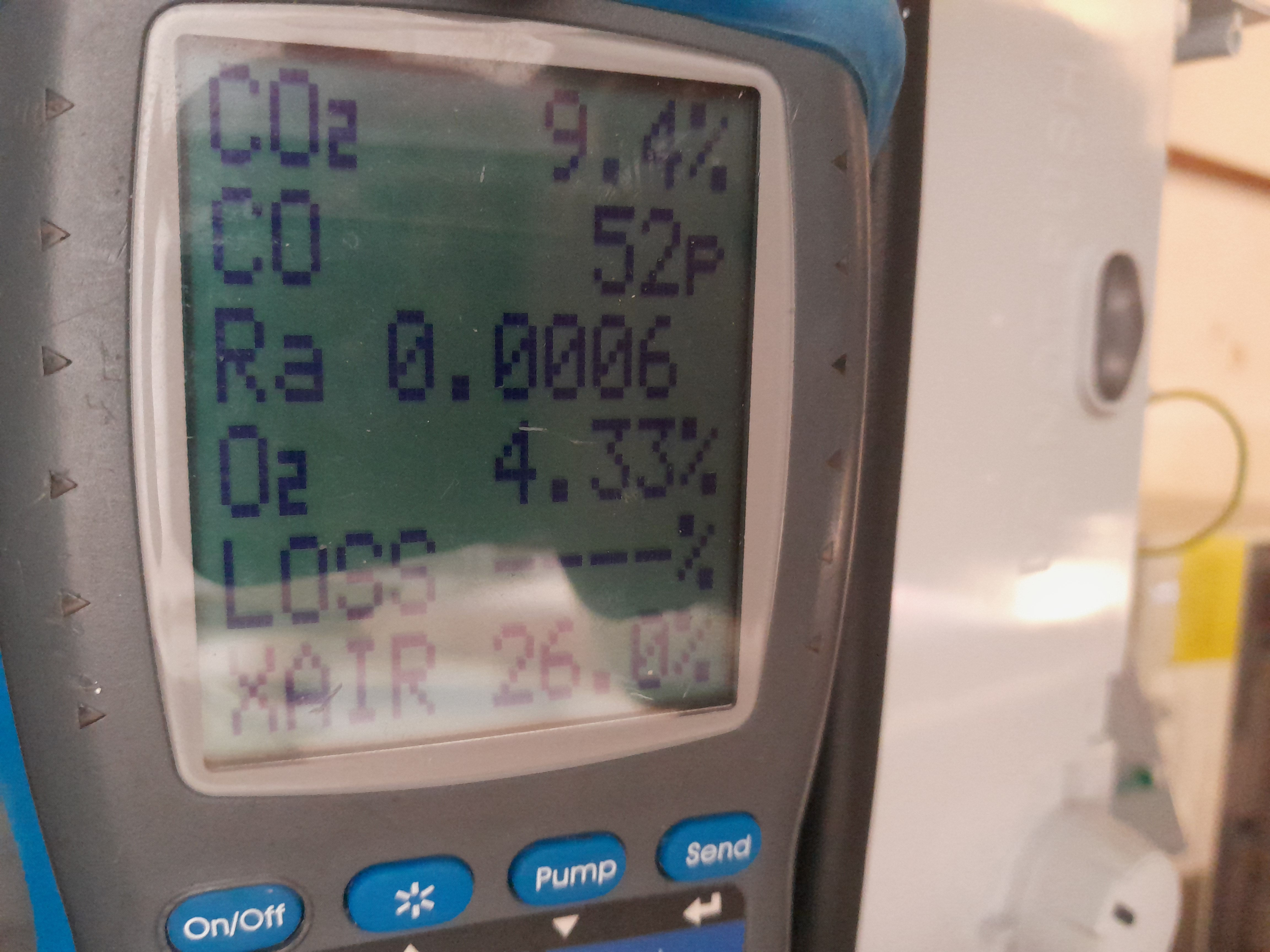 Flue gas analyzer readout during a gas safety inspection in Cobham
