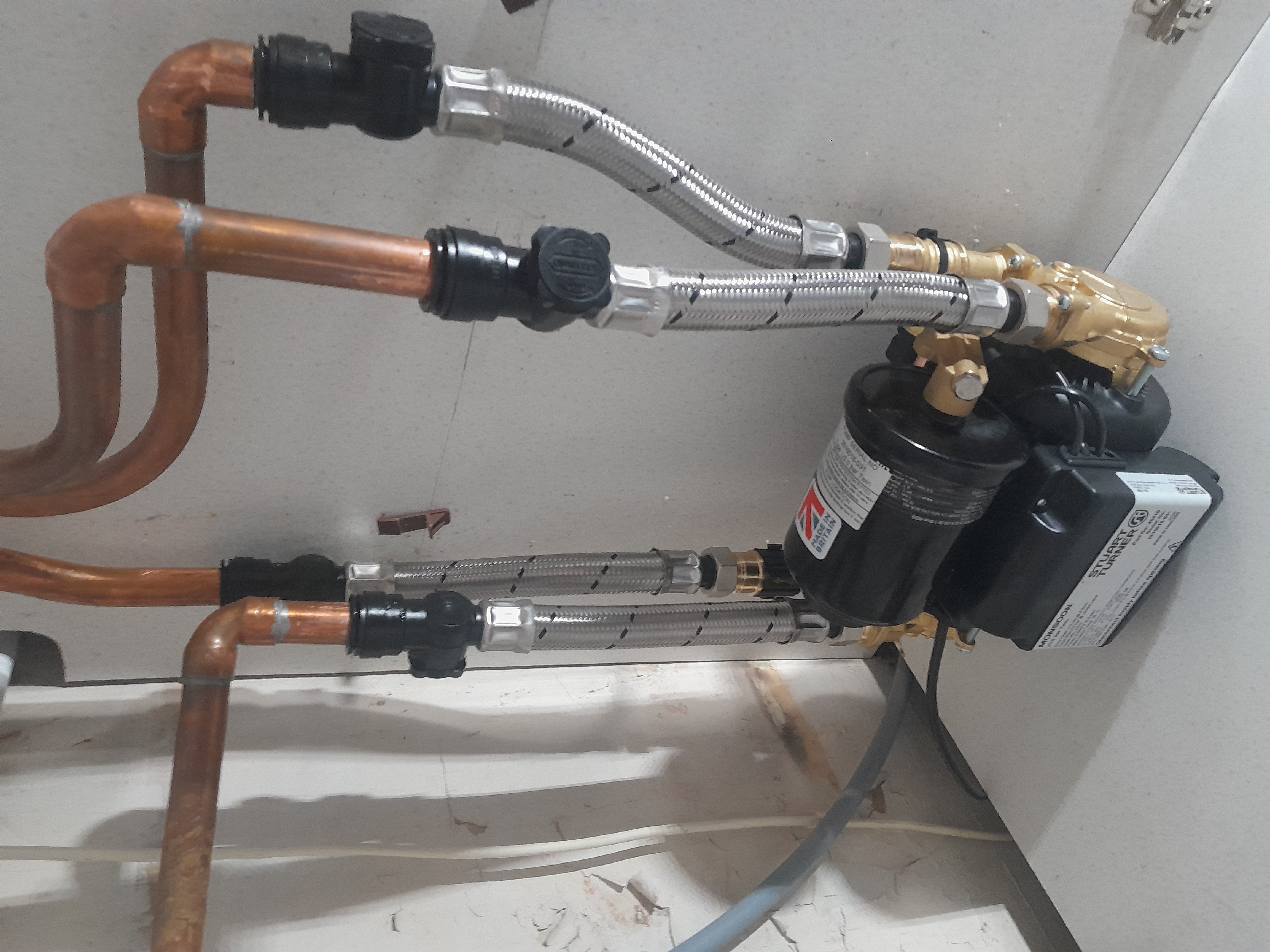 Stuart Turner pump connected with new copper pipework and braided hoses